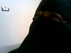 Египетская роговой женщина в Niqab
